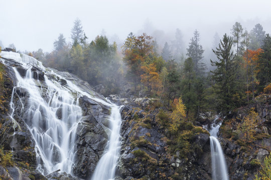 Nardis Waterfall on foggy Autumn day, Trentino Alto Adige, Italy