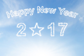 Happy new year 2017 and star cloud on blue sunshine sky