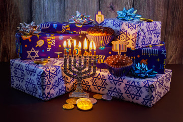 Jewish holiday HanukkahBeautiful Chanukah decorations in blue and silver with gifts © ungvar