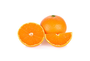 whole and cut ripe orange on white background