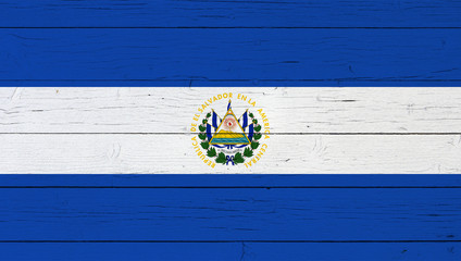 Flag of El Salvador on wooden background - obrazy, fototapety, plakaty