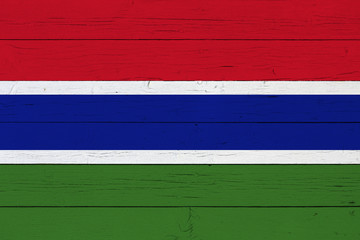 Flag of Gambia on wooden background