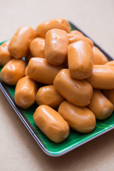 fresh mini sausage in dish