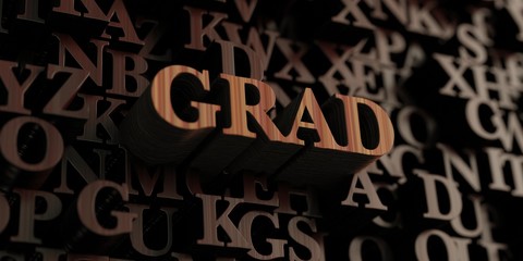 Grad - Wooden 3D rendered letters/message.  Can be used for an online banner ad or a print postcard.