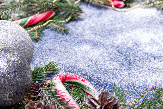 Christmas Composition with Snow Silver Balls Candy Cane Pine Con