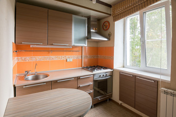 The interior of an empty kitchen equipment for sale