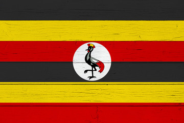 Flag of Uganda on wooden background
