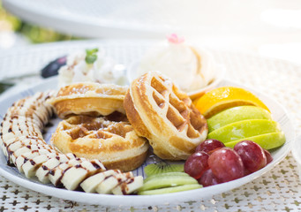 French toast with ice cream and fruit.