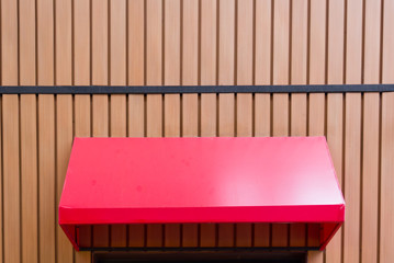 red awning over window and wooden wall background, free copy spa