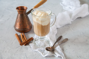 coffee with ice cream in a glass on a table, selective focus
