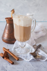 coffee with ice cream in a glass on a table, selective focus