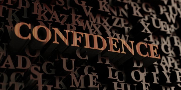 Confidence - Wooden 3D rendered letters/message.  Can be used for an online banner ad or a print postcard.
