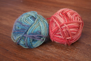 Blue and red woolen balls