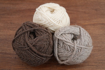 Brown and white woolen balls