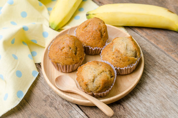 Banana muffins cupcake on wooden background