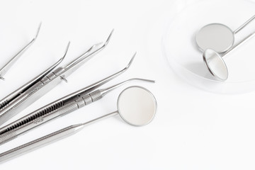 dental tools on white background top view
