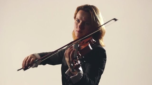 Woman Playing On Violin On White Backgraund