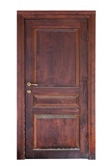 A wooden panel door with its casing isolated on white background