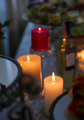 lighted candles on the holiday table