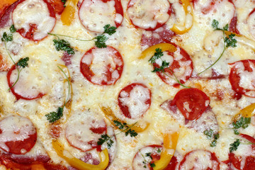  large hot reinforcement forces/ homemade pizza with cheese, sausage, vegetables and herbs top view 