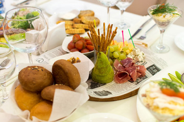 Different snacks for wine on banquet table
