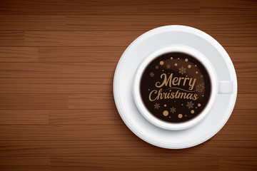 coffee mug with words merry Christmas on brown wood table