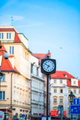 Street clock on the square in European cities