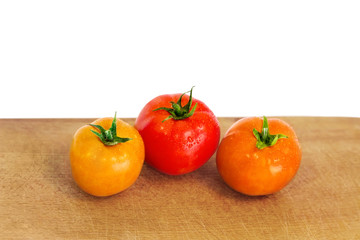 tomatoes on the wooden board