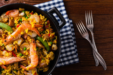 Traditional Spanish paella with seafood and chicken.