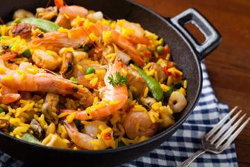 Traditional Spanish paella with seafood and chicken.