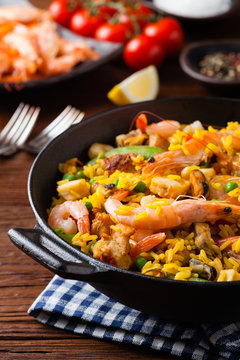 Traditional Spanish paella with seafood and chicken.