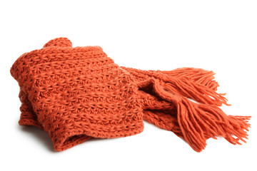 Orange knitted scarf isolated