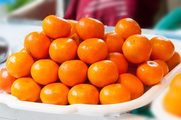 tangerine on a counter of shop