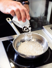 chef making risotto