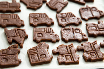 cutting cookies dough cars shape. homemade bakery