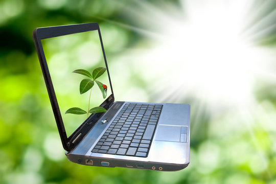 Image of a laptop on a green background.
