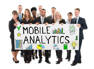 Businesspeople Holding Banner Of Mobile Analytic