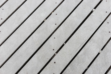 Old grey wood plank background at an angle