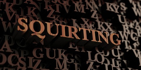 Squirting - Wooden 3D rendered letters/message.  Can be used for an online banner ad or a print postcard.