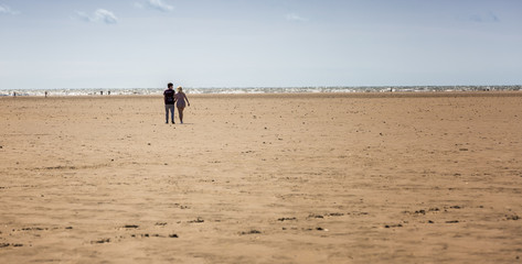 Fototapeta na wymiar walk on the beach