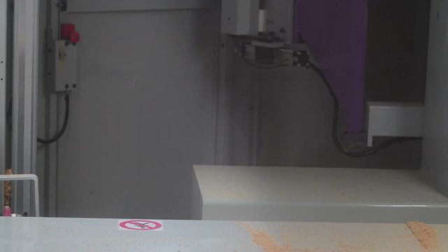 Two wooden sheets with pattern after CNC machining the cutting of the wooden sheet into a pattern