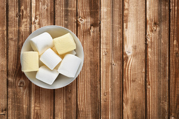 Marshmallow on wooden table