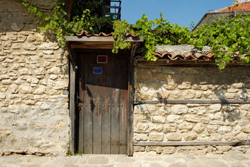 Door on street in old town of Nesebar, Bulgaria