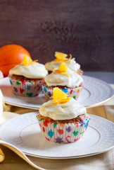 Orange cupcakes with frosting