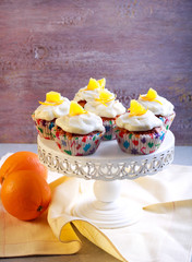 Orange cupcakes with frosting