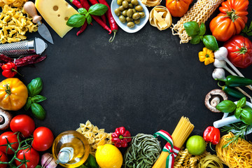 Italian food ingredients on slate background