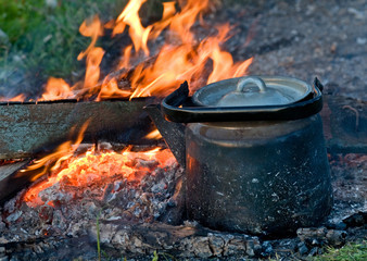 Teapot on a fire.