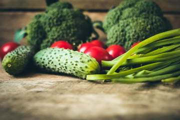 Fresh Raw Broccoli, Cheery tomatoes and cucumbers.Vegetables