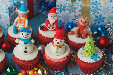 Christmas cupcakes with colored decorations