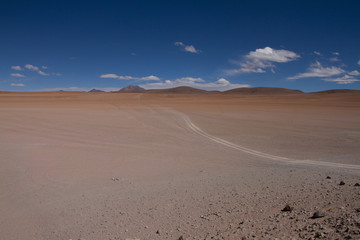 Desert and mountain over blue sky and white clouds on Altiplano,Bolivia Chile 